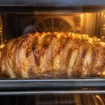 découvrez comment le four chaud permet de gratiner parfaitement la cuisson du rôti de porc orloff déjà préparé, pour un plat savoureux et fondant.